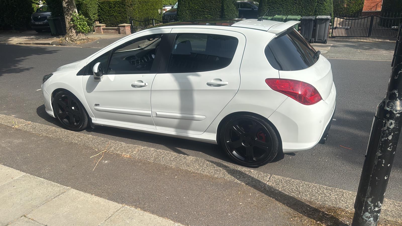 Peugeot 308 rear side